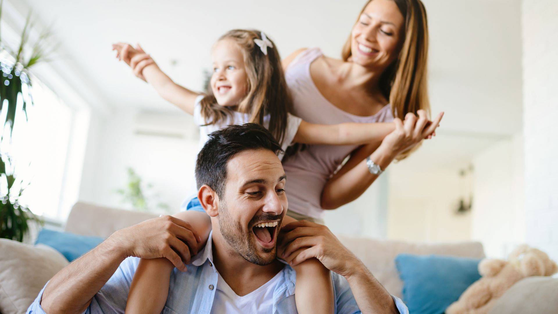 Happy family in Denver enjoying their well-maintained indoor air quality home.