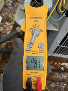 Eugene AC repair technician troubleshooting weak airflow to improve cooling performance during summer heat
